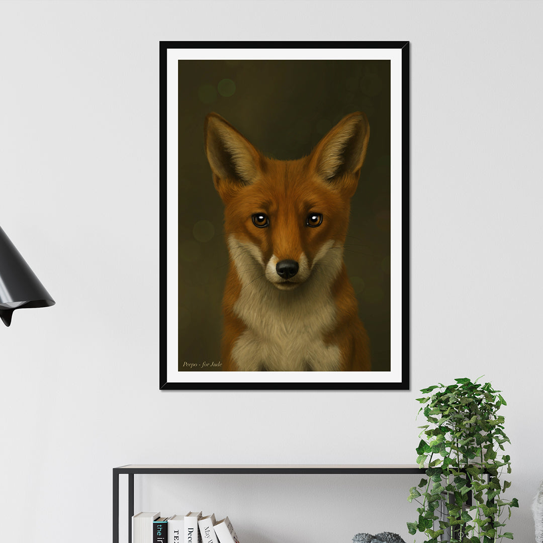 Framed artwork of a fox on a wall with a shelf and plant below.