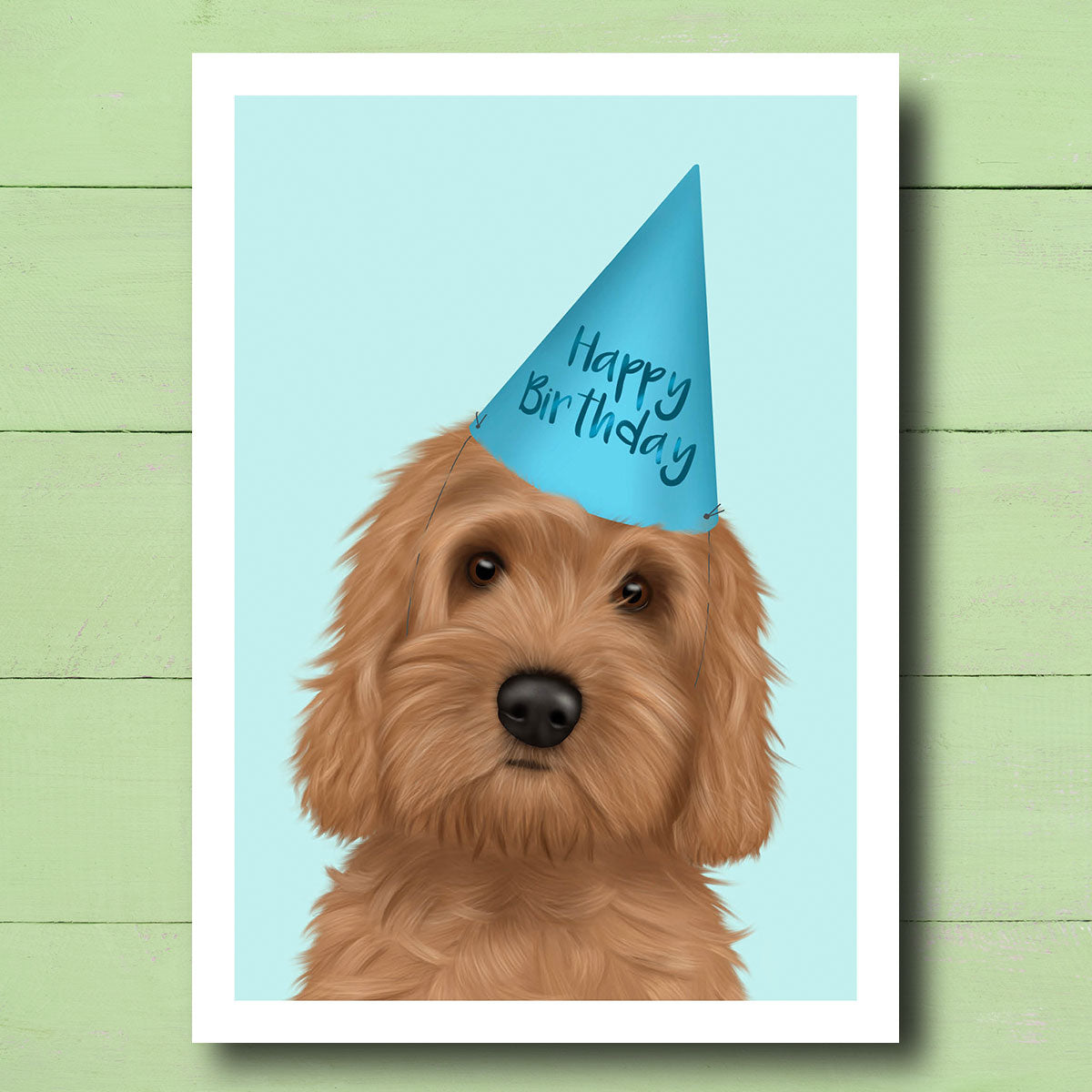 Birthday card with Cockapoo wearing party hat - blue