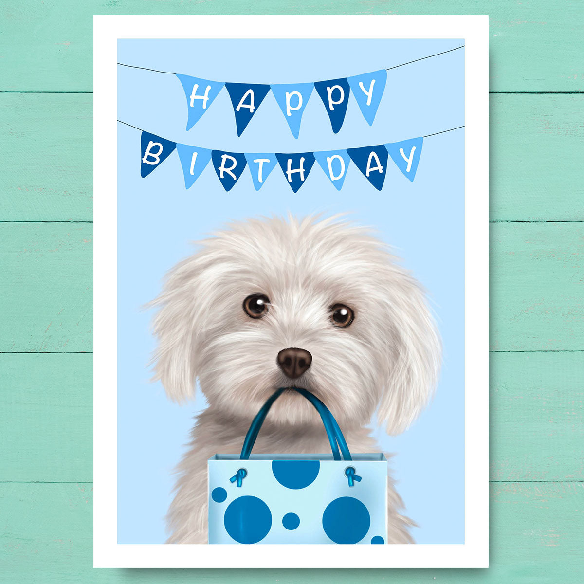 Birthday card featuring a Maltese dog breed holding a gift bag in mouth